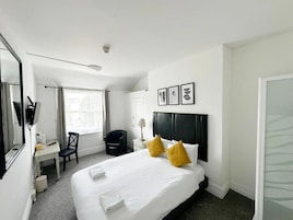 Double Room, City View | Iron/ironing board, free WiFi