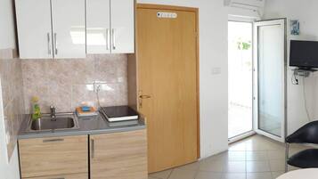 Fridge, stovetop, cookware/dishes/utensils