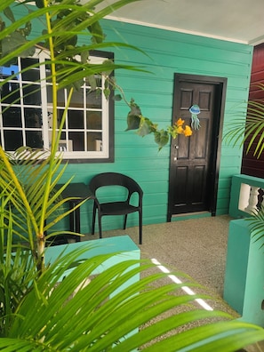 Comfort Double Room, Garden View | Terrace/patio - Roots Cafe Negril (Negril)