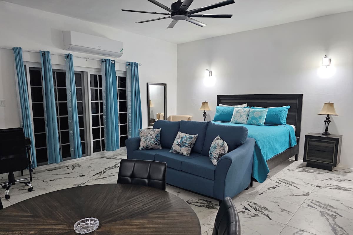 Luxury Suite, Sea View, Ground Floor | In-room safe, blackout curtains, iron/ironing board, free WiFi