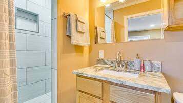 Hair dryer, towels, soap, shampoo