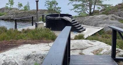 Lovely summer house near Risør with boat