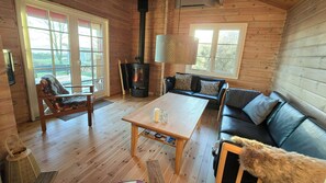 TV, fireplace - Red timber house with fjord view (Roslev)