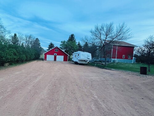 Prairie and Pine! Beautiful homestead featuring 4 bedrooms in Belfield, ND