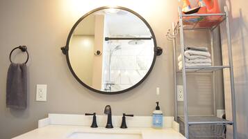 Hair dryer, towels, soap, shampoo