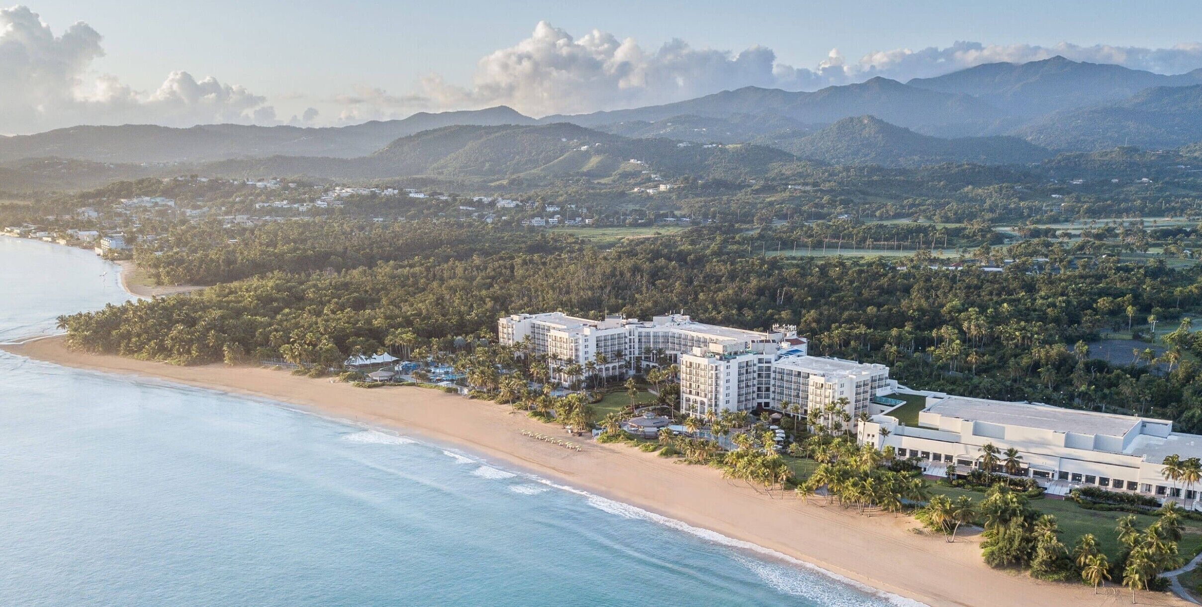 On the beach, white sand, free beach shuttle, beach cabanas