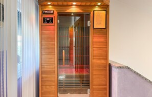 An elevator with a wooden finish, a digital display, and a plaque. - Cozy home in Vardica with sauna (Vardica)