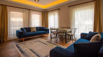 Family Condo, Balcony | Living area | Heated floors