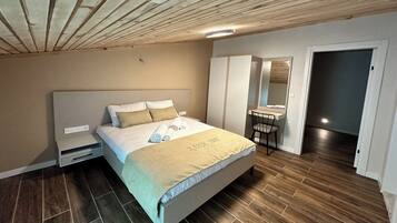Family Apartment | Desk, blackout drapes, iron/ironing board, free WiFi