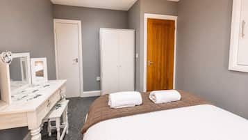 1 bedroom, desk, iron/ironing board, travel cot