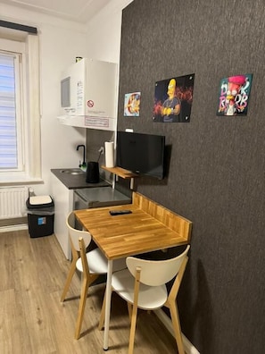 Chambre Double, vue ville | Cuisine privée