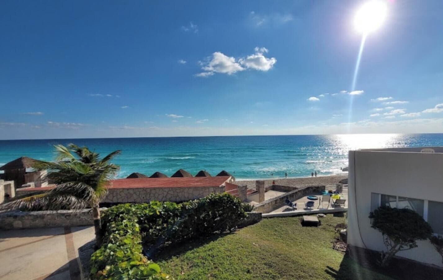 Deluxe Quadruple Room, Balcony, Sea View | Property grounds