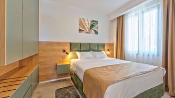 In-room safe, desk, blackout curtains, soundproofing