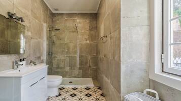 Hair dryer, towels, soap, toilet paper