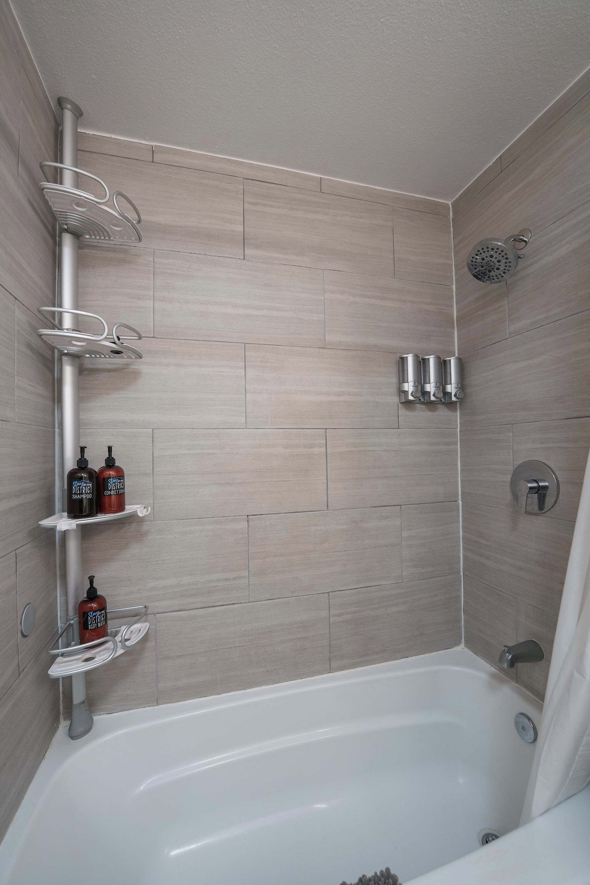 Shower, hair dryer, towels, shampoo