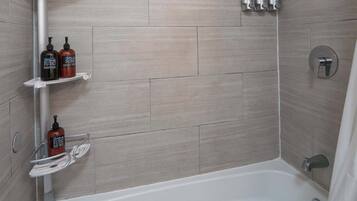 Shower, hair dryer, towels, shampoo