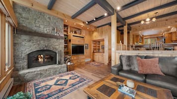TV, fireplace, books, stereo