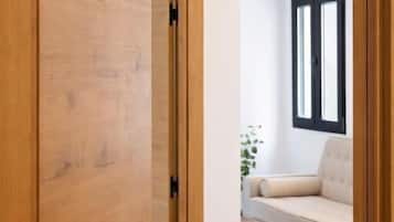 Deluxe Studio | Living area | 32-inch flat-screen TV with digital channels