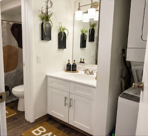 Hair dryer, towels, soap, toilet paper