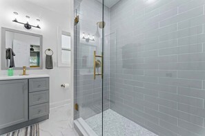 Shower, hair dryer, towels, shampoo - SMV Modern Luna Duplex in Murry Hill (Jacksonville)