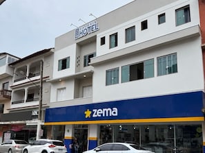 A hotel with a ZEMA store on the ground floor.