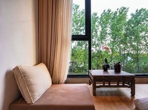 Chambre romantique double | Aire de séjour