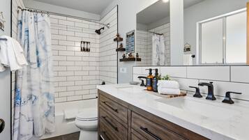 Hair dryer, towels, soap, shampoo