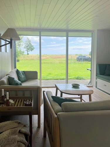 Home at the front row by Hou Beach