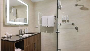 Shower, hair dryer, towels, shampoo