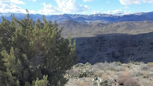 A mountainous landscape with sparse vegetation and a clear sky. - Kiteville Cordes Lake RV Park (Cordes Lakes)