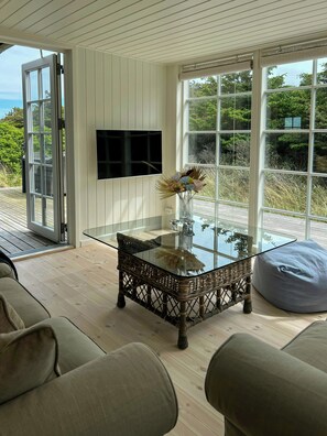 TV, fireplace - Beach hotel inspired holiday home at Tranum Strand (Brovst)