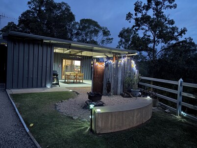 Hayden's Place is a cozy tiny off‑grid home offering stunning 180° views.