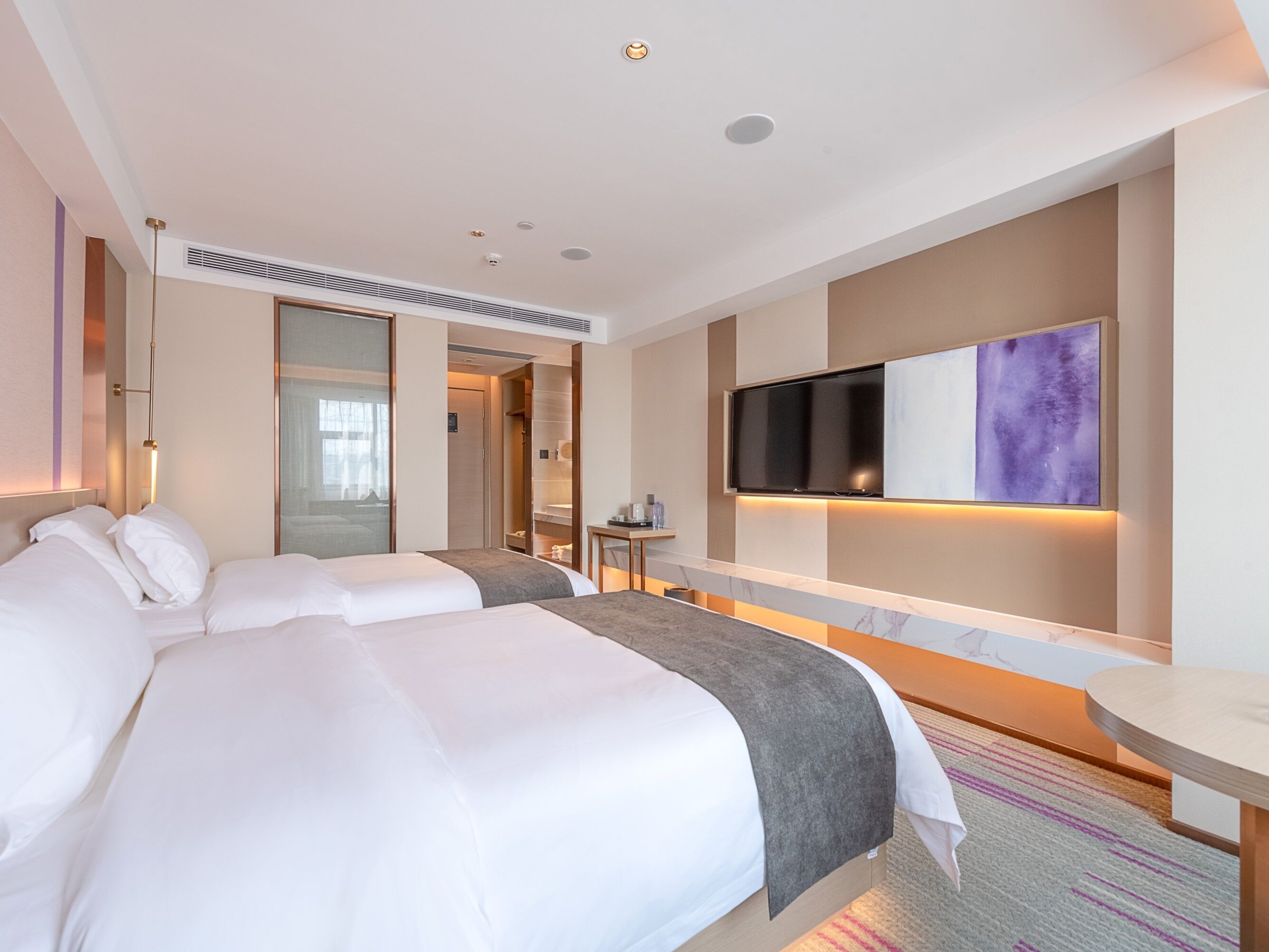 Premium bedding, desk, laptop workspace, blackout curtains
