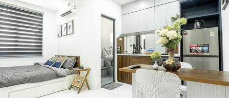 Apartment, Patio, Courtyard View | Free minibar items, desk, blackout drapes, soundproofing