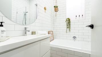 Shower, eco-friendly toiletries, hair dryer, towels