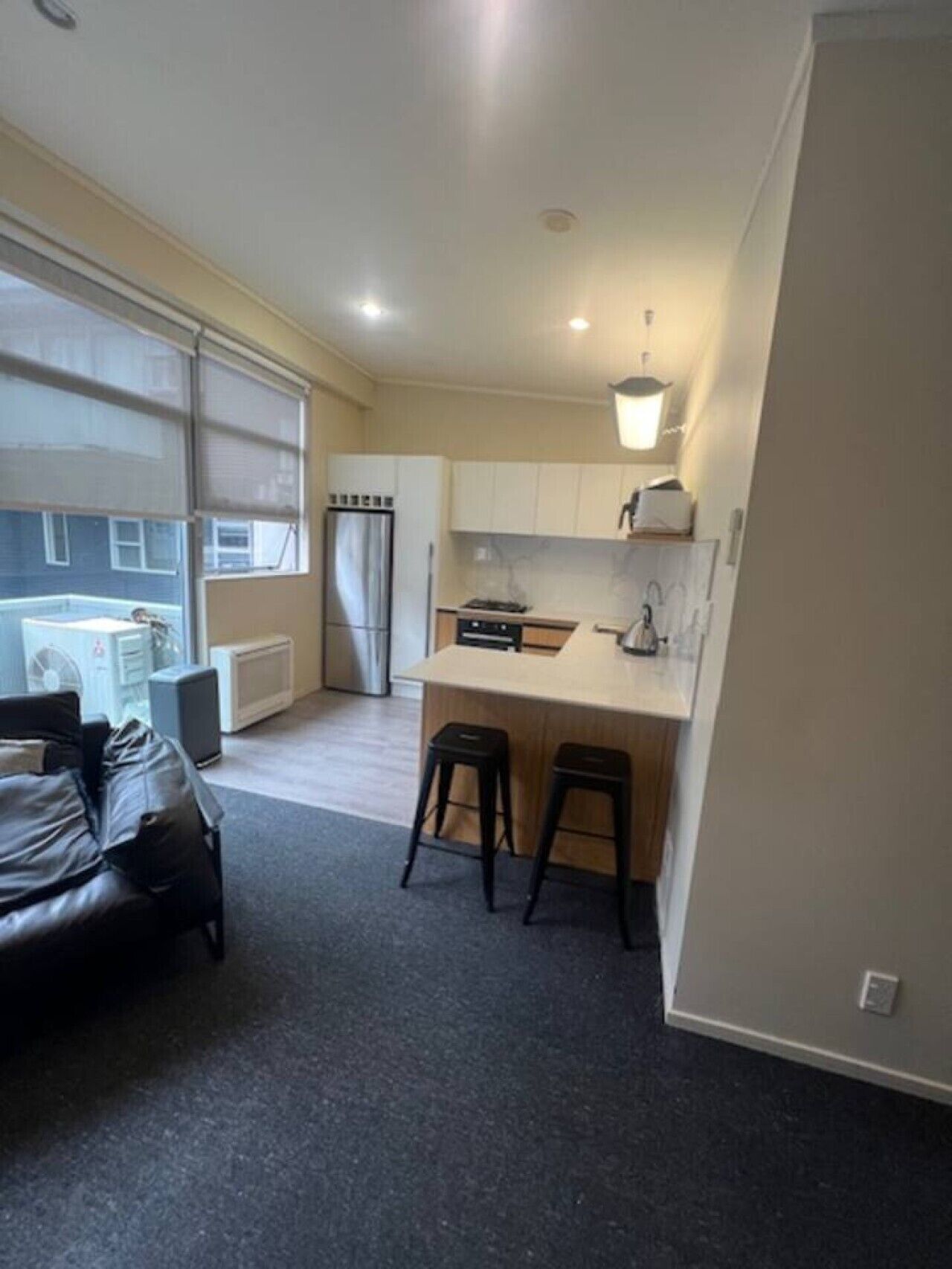 Light-filled open-plan kitchen and living space designed for comfort and easy stays