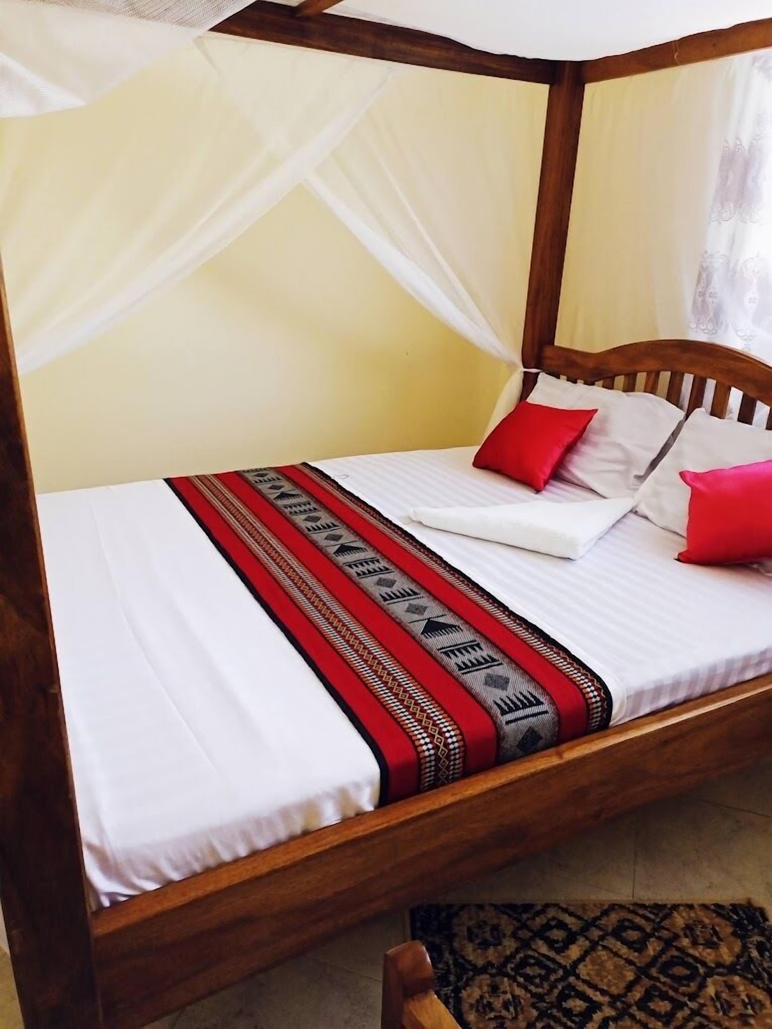 Habitación individual Deluxe | Decoración individual, mobiliario individual, wifi gratis y ropa de cama