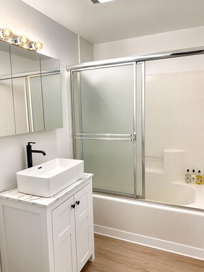 Hair dryer, towels, soap, toilet paper