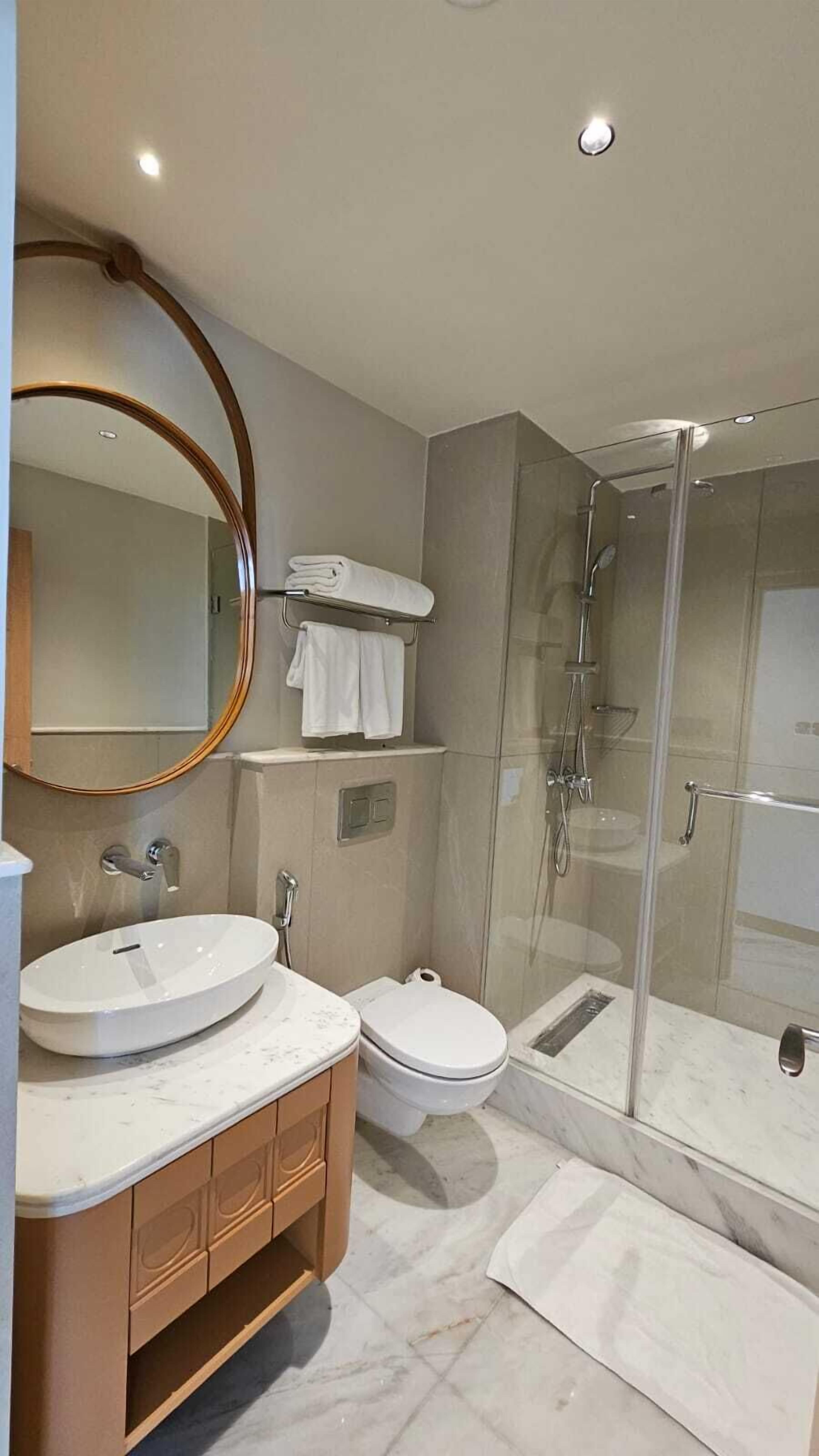 Hair dryer, slippers, towels, soap