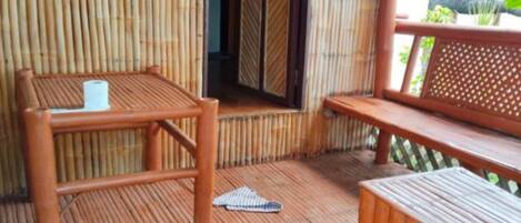 Basic Triple Room, Balcony, Partial Ocean View | Outdoor dining
