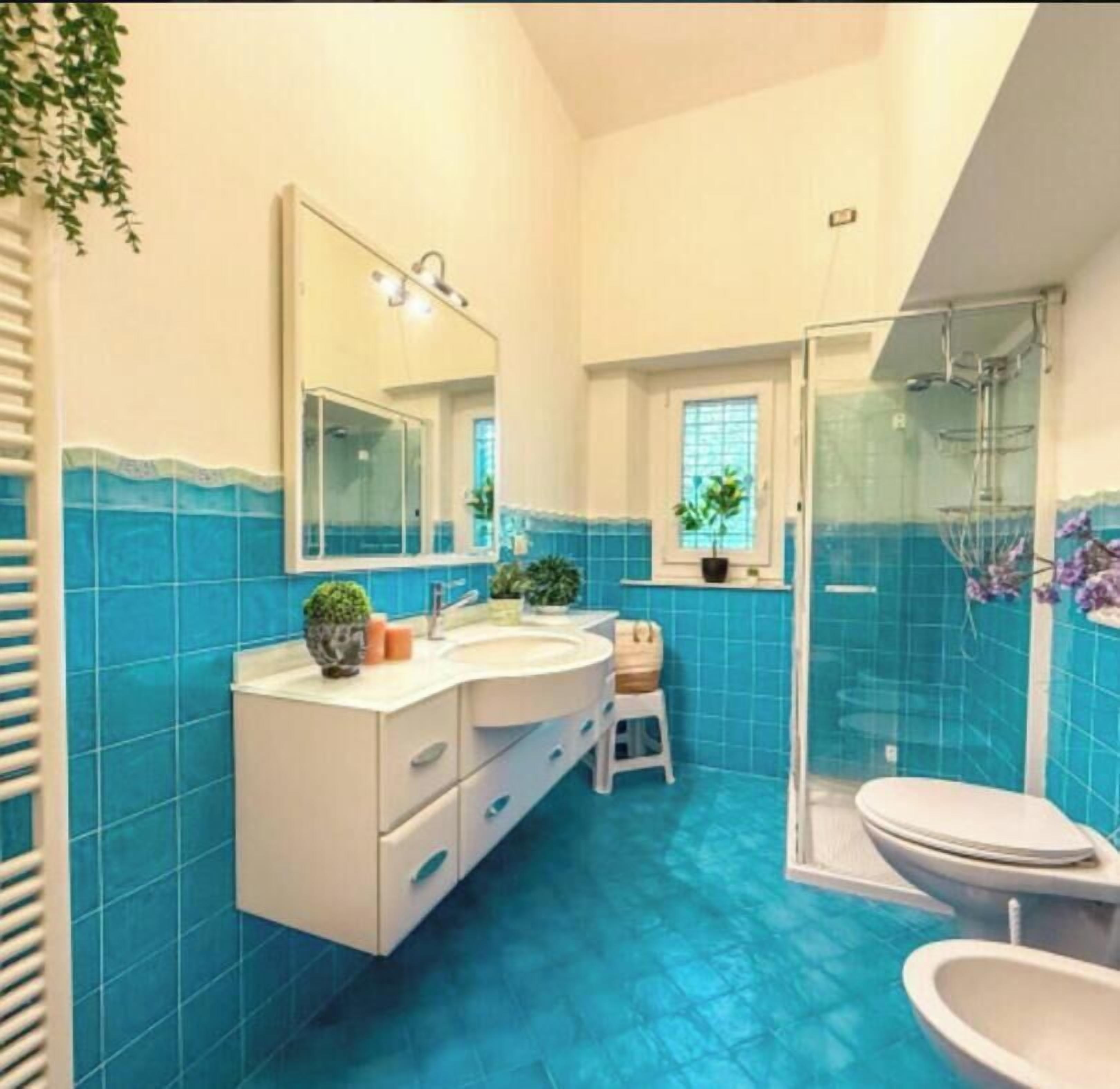 Apartment, Garden View (in Villa) | Bathroom | Shower, hair dryer, towels, soap