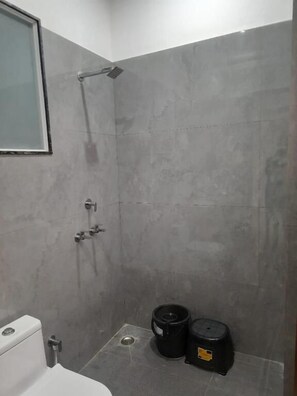 Shower, towels, soap, shampoo