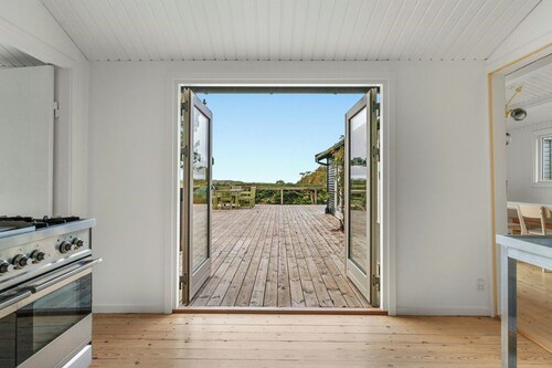 Black wooden house with panoramic views