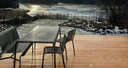 Architect-designed cabin by lake with sauna