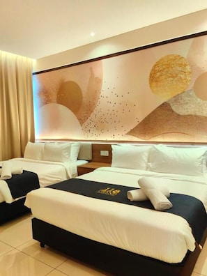 A hotel room with two beds, a large abstract wall art piece, and a modern design. - 118 Grand Hotel (George Town)