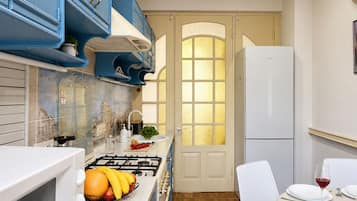 Comfort Apartment, Balcony, Park View | Private kitchen | Electric kettle, cleaning supplies, freezer