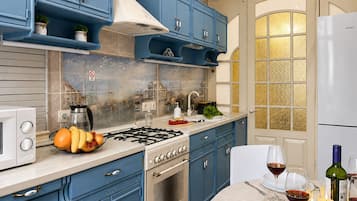 Comfort Apartment, Balcony, Park View | Private kitchen | Electric kettle, cleaning supplies, freezer