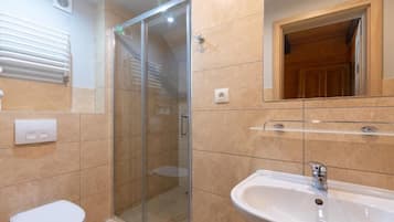 Deluxe Quadruple Room, Balcony, Mountain View | Bathroom | Shower, towels, toilet paper