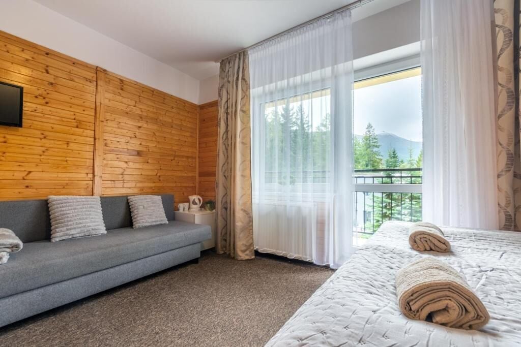 Triple Room, Balcony, Mountain View | Living area