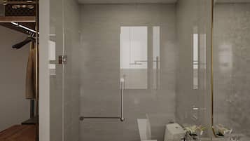 Superior Studio | Bathroom | Deep soaking tub, rainfall showerhead, designer toiletries, hair dryer